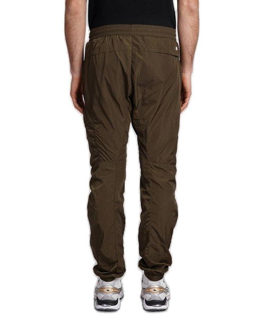 C P Company Brown Logo Patch Tapered Cargo Pants for men
