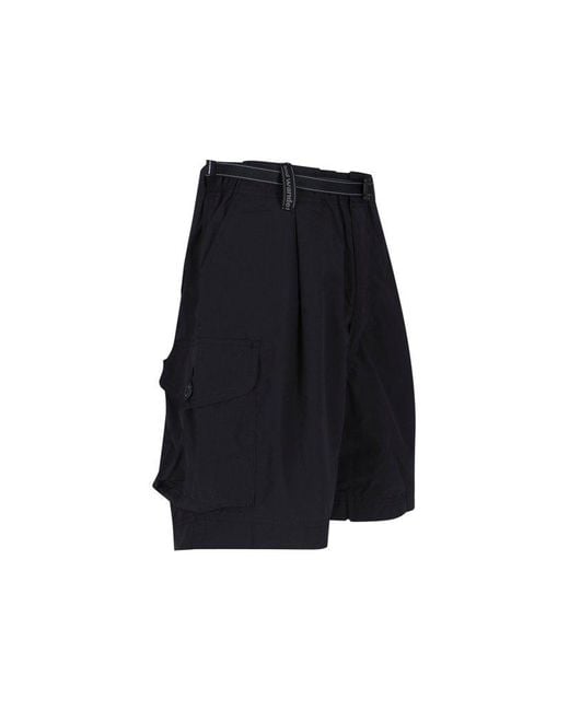And Wander Blue Oversized Cargo Belted Shorts for men