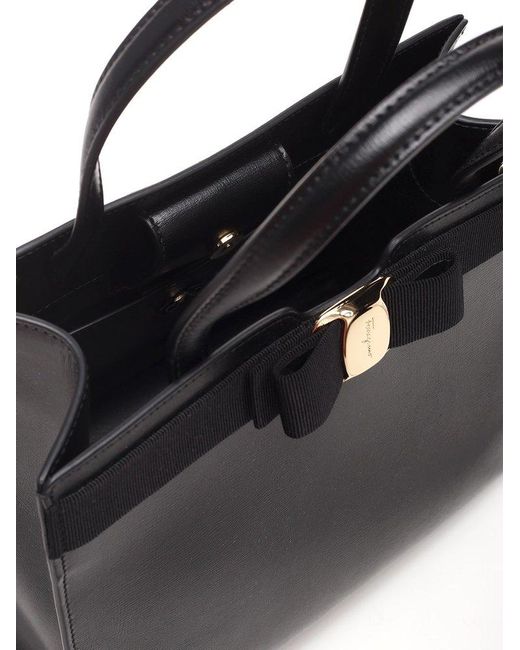 Ferragamo Vara Bow Medium Top Handle Bag in Black | Lyst