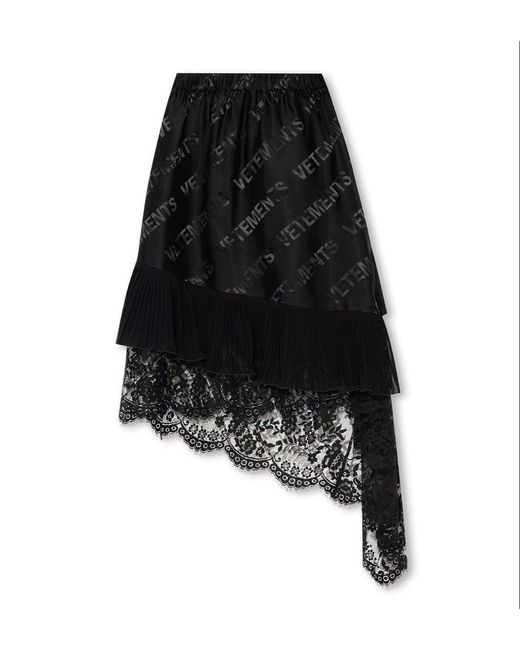 Vetements All-over Logo Embossed Asymmetric Skirt in Black