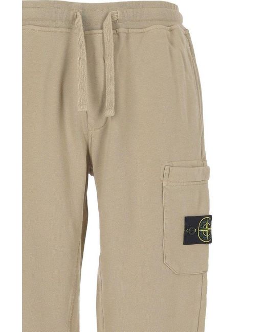 Stone Island Natural Logo Patch Drawstring Trousers for men