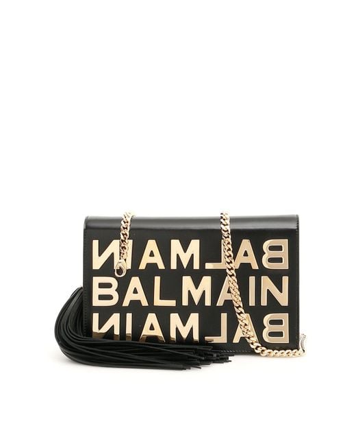Balmain Logo Embossed Crossbody Bag in Black | Lyst