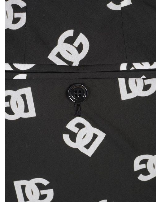 Dolce & Gabbana Black All-over Logo Printed Trousers for men
