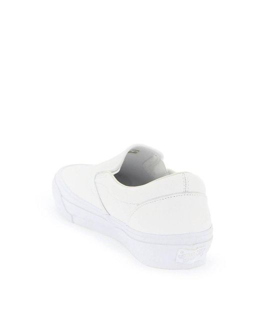 Vans White Logo Patch Slip-on Sneakers