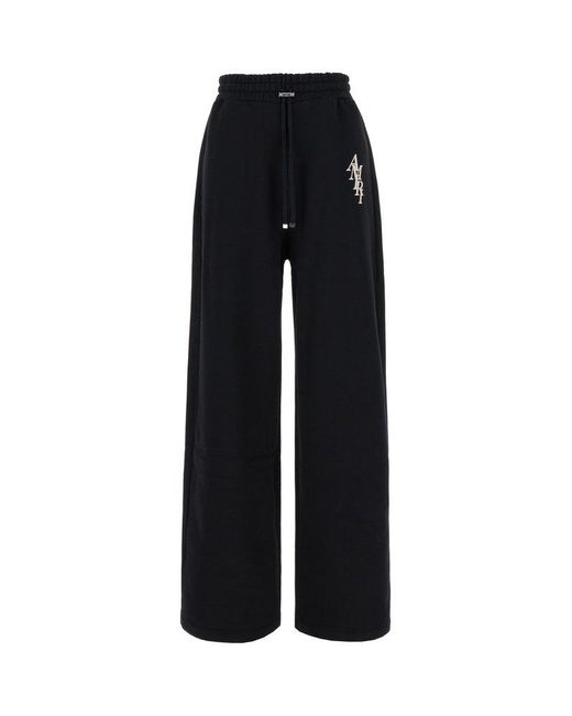 Amiri Vertical Stack Baggy Sweatpants in Black | Lyst