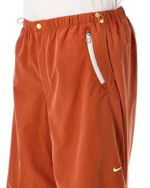 Nike Orange F.R.O.G. Parachute Trousers for men