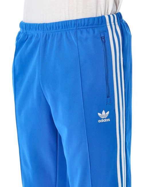 Adidas Originals Blue Beckenbauer Logo Embroidered Striped Track Pants for men