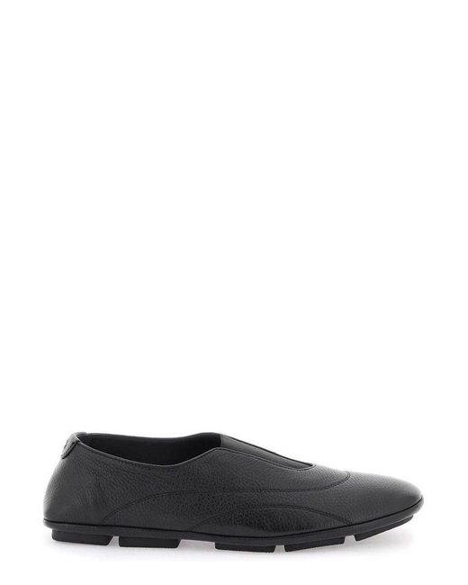 Dolce & Gabbana Black Logo Embossed Loafers for men