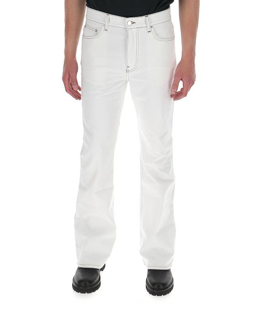 Amiri Denim Logo Patch Flared Jeans in White for Men - Lyst
