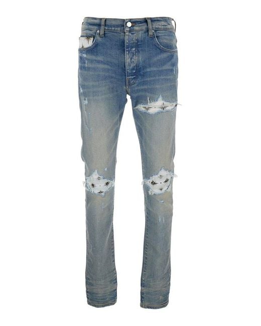 Amiri Blue Light Jeans With Ribbed Details On The Front And Logo Patch On The Rear for men