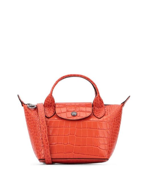 Longchamp Le Pliage Cuir Xs Top Handle Bag in Orange Lyst UK