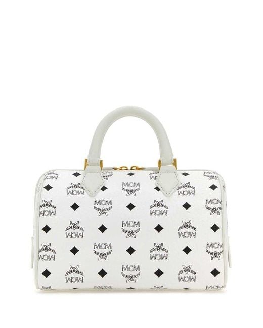 MCM White Handbags.
