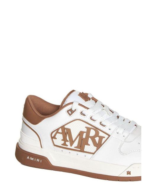 Amiri White Logo Embossed Low Top Sneakers for men