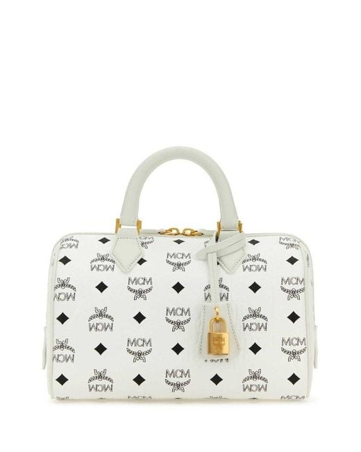 MCM White Handbags.