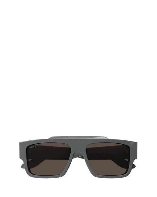 Navigator frame sunglasses in yellow gold metal | GUCCI® US
