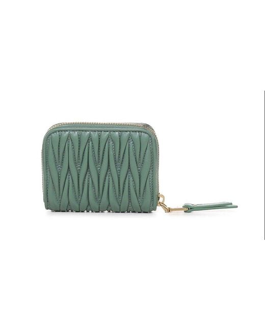 Miu miu portafoglio zip discount around logo wallet dimesinos