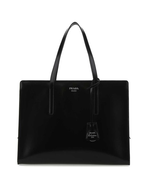 Prada Leather Re-edition 1995 Logo Plaque Tote Bag in Black - Lyst