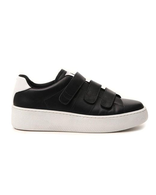 black leather tennis shoe