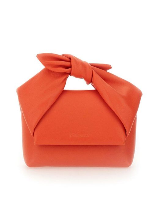 J.W. Anderson Orange Small Bow Twister Top Handle Bag