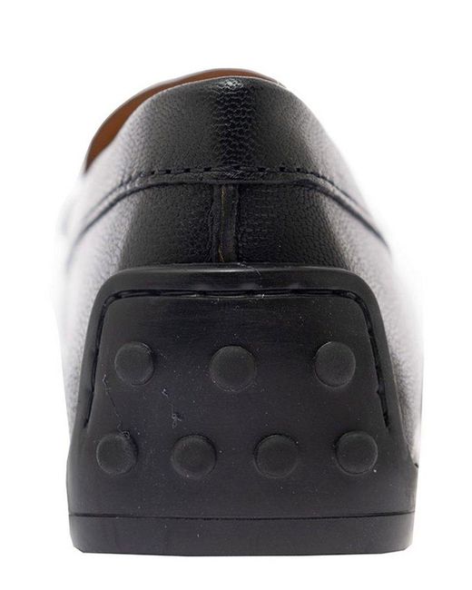 Tod's Black Logo Embossed Loafers