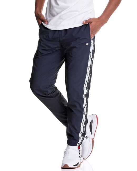 Champion Double Logo Tape Insert Water Repellent Track Pants in Navy (Blue)  for Men - Lyst
