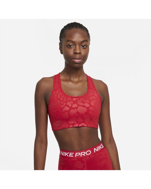 Nike Synthetic Pro Dri-fit Swoosh Women's Medium-support Leopard Sports Bra  in Red/Red (Red) | Lyst