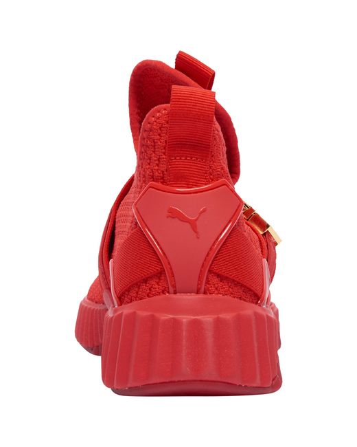 PUMA Rubber Defy Mid Buckle in Red | Lyst