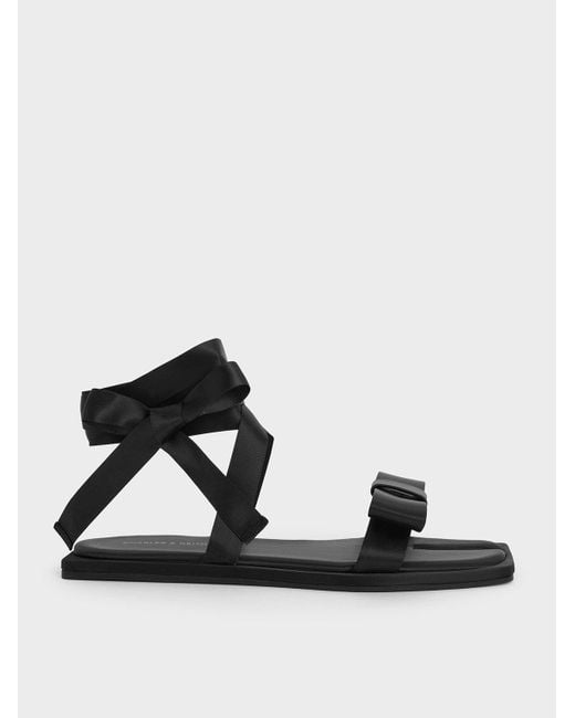 Charles & Keith Black Satin Bow Tie-Around Flat Sandals