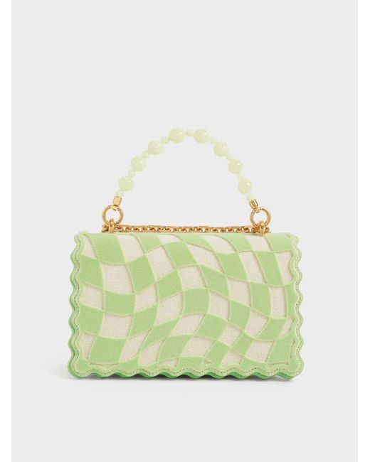 green bag charles and keith glow in the dark