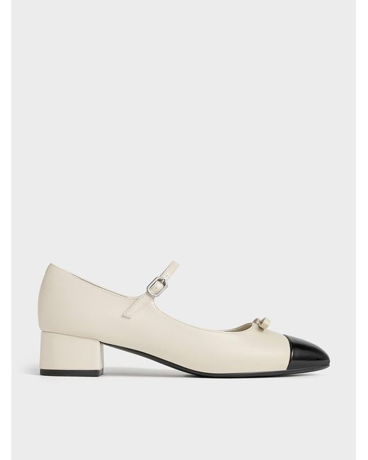 Charles & Keith Natural Bow Cap-Toe Mary Jane Pumps