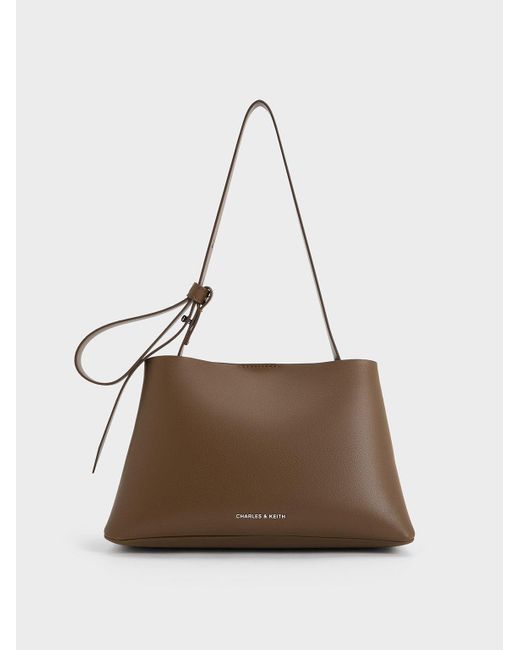 Charles & Keith Brown Odella Trapeze Bucket Bag