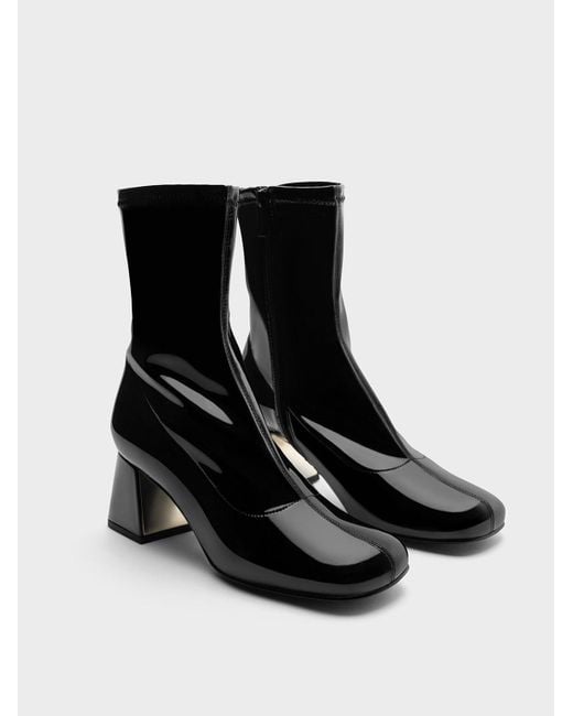 Charles Keith Patent Metallic Trapeze Heel Ankle Boots in Black