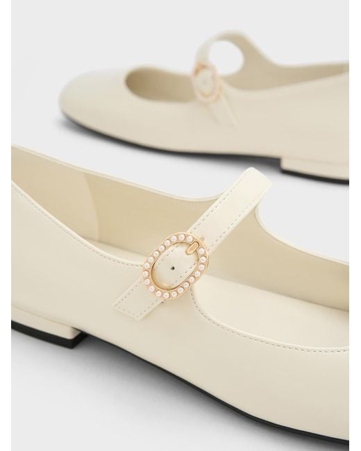 Charles & Keith White Pearl-buckle Mary Janes