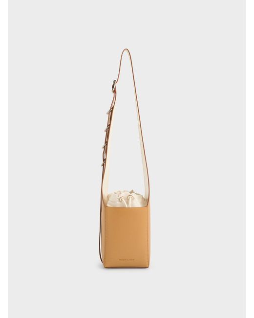 Charles & Keith Rebel Bucket Bag in White | Lyst