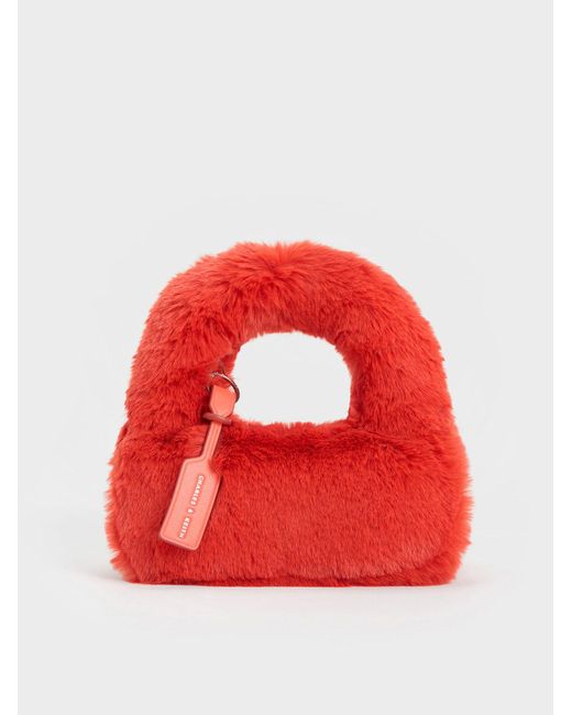 Charles & Keith Red Mini Yama Furry Top Handle Bag