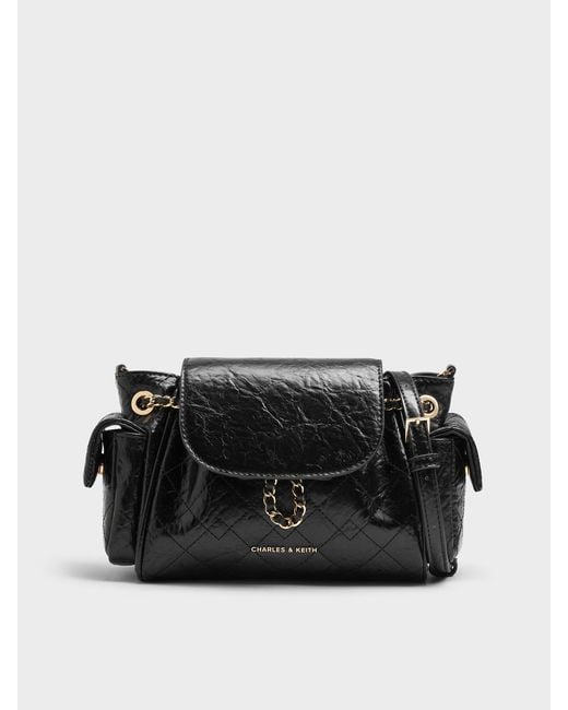 Charles & Keith Duo Quilted Two-Way Front Flap Backpack in Black