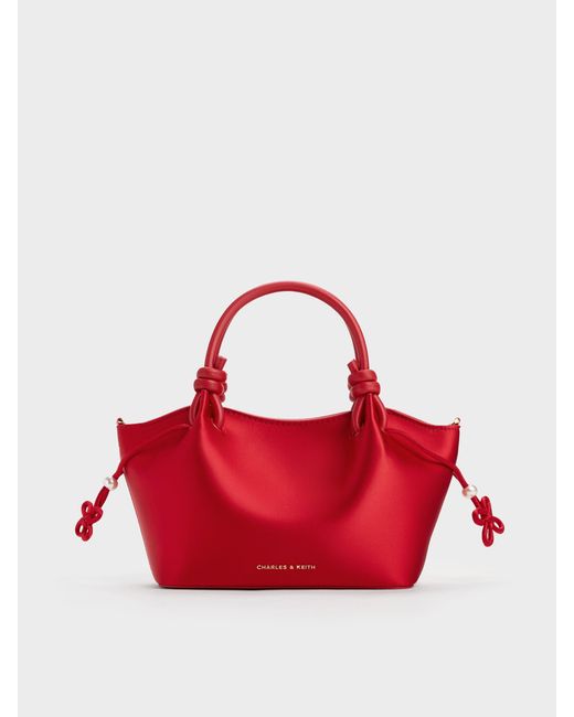 Charles & Keith Red Sammie Pearl-Butterfly Knotted-Handle Wavy Tote Bag