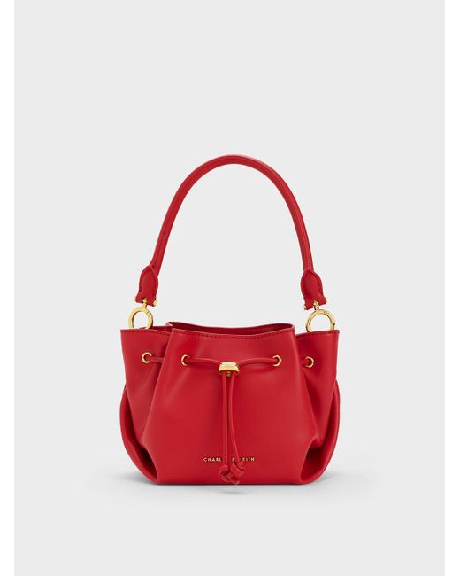 Charles & Keith Boaz Drawstring Top Handle Bag in Red | Lyst