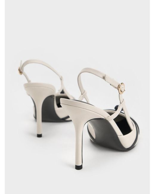 Charles & Keith White Rose Pointed-toe Slingback Pumps