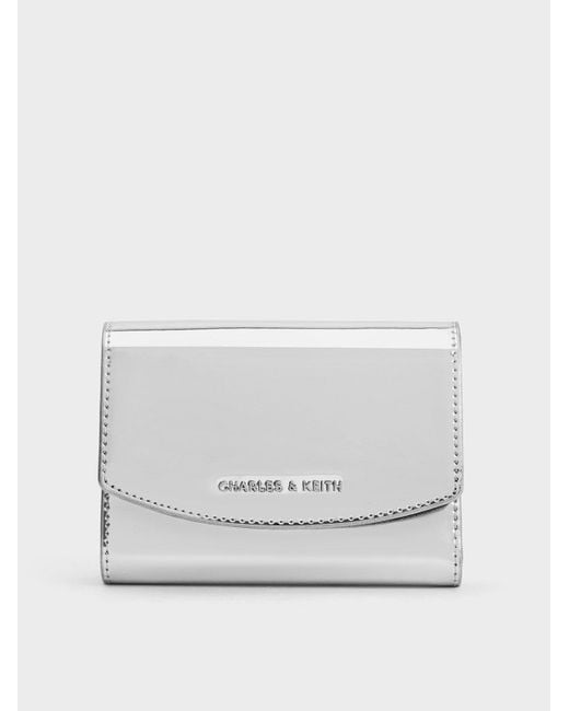 Charles & Keith White Metallic Curved Front Flap Wallet