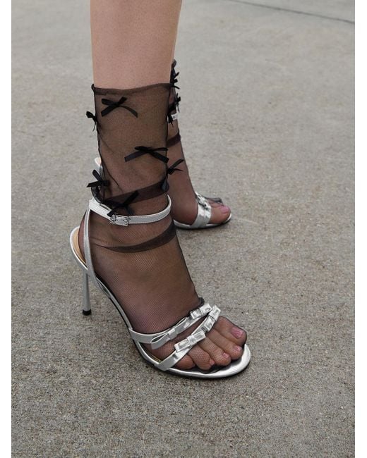 Charles & Keith White Jessy Metallic Leather Bow Ankle-Strap Stiletto-Heel Sandals