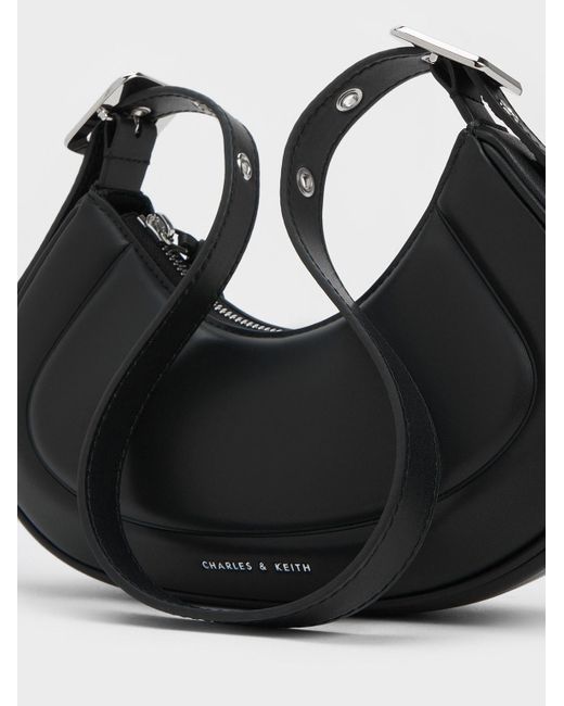 Charles & Keith Black Petra Curved Shoulder Bag
