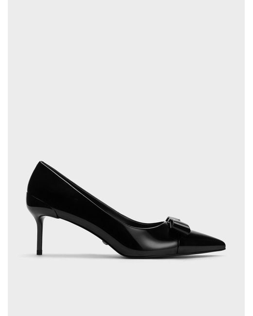 Black and white best sale pointed toe heels