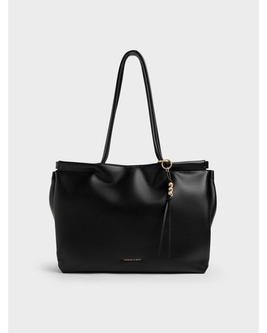 Charles & Keith Black Xl Zephyr Tassel Tote Bag