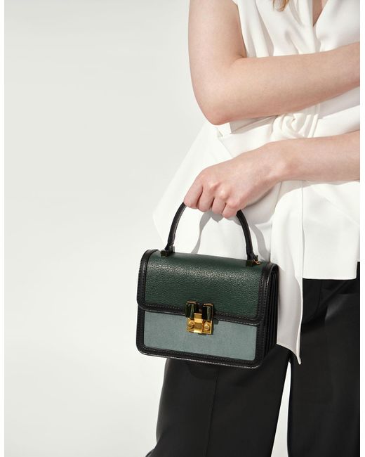 charles & keith oversized chain strap bag