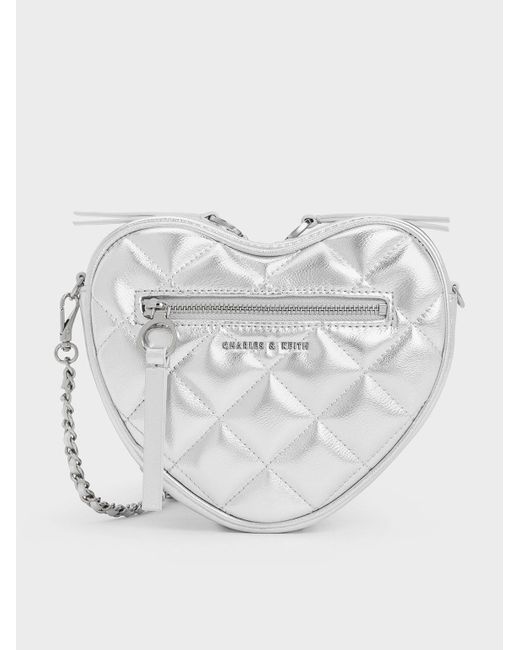 Charles & Keith Philomena Metallic Quilted Heart Crossbody Bag in White