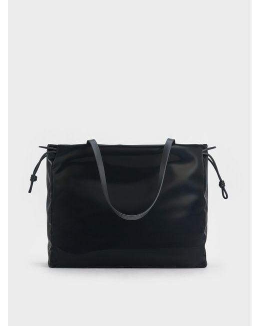 Charles & Keith Bethel Shiny Ruched Drawstring Tote Bag in