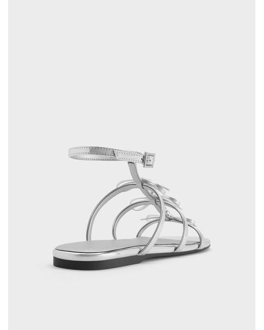 Charles & Keith White Metallic Gem-Embellished Bow T-Bar Sandals