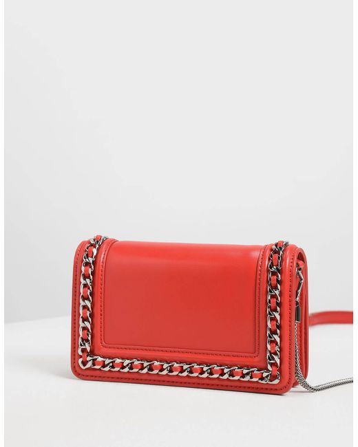 charles & keith chain detail clutch