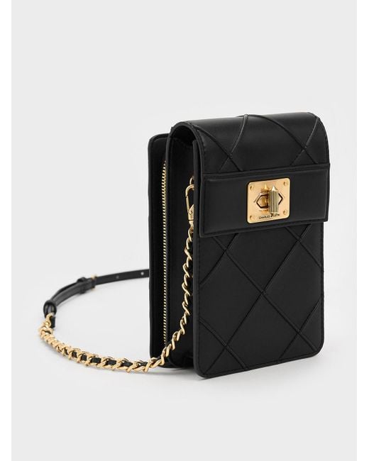 Charles & Keith Black Eleni Quilted Elongated Crossbody Bag